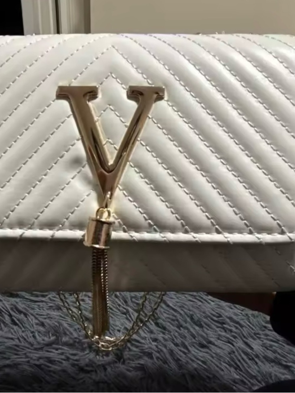 Gold-Tassel White Quilted Clutch